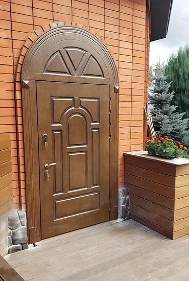 Арочная утепленная дверь